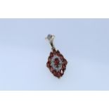 9ct Yellow Gold Garnet And Diamond Pendant