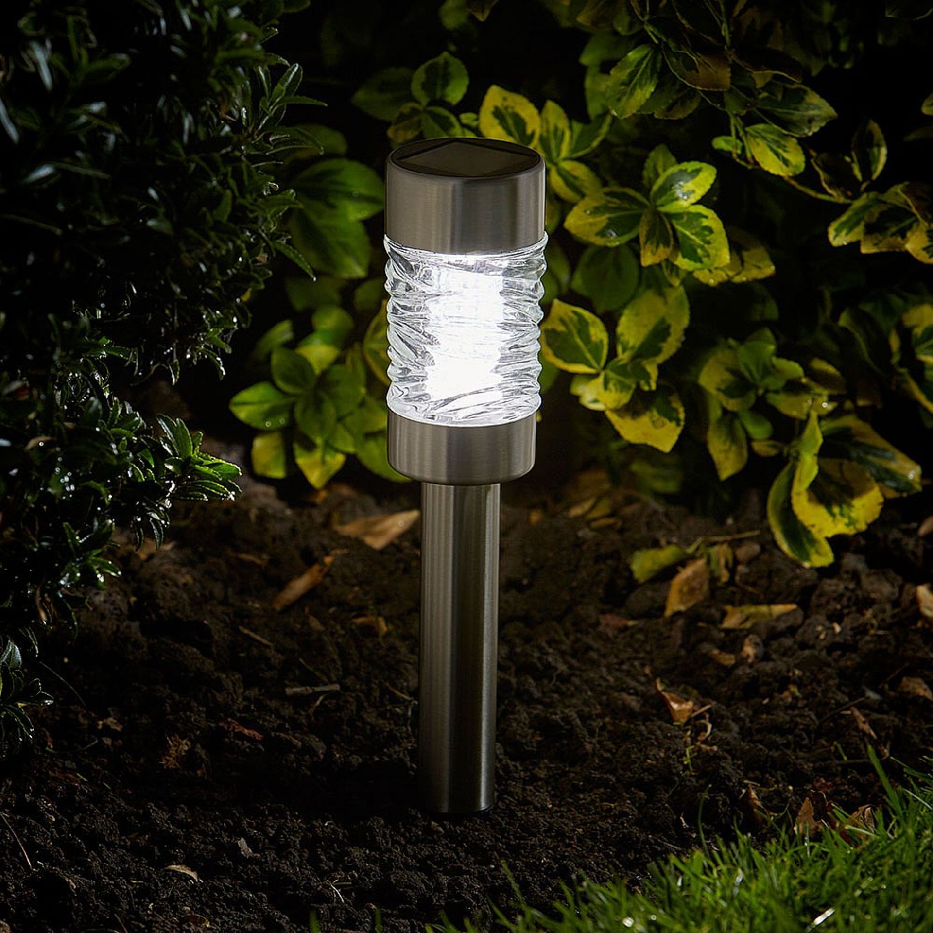 NEW (Z125) Solar Stake Light. Brushed stainless steel finish, with glass lens 3 lumen output, ...