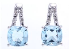 9ct White Gold Diamond And Blue Topaz Earrings