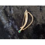 Scimitar shaped brooch