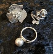 Group lot of white metal dress rings