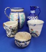 Group of hand thrown pottery items.