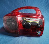 Red Transparent FreePlay Wind UP and Solar powered Radio