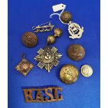 Group of military badges and buttons