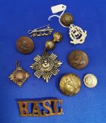Group of military badges and buttons