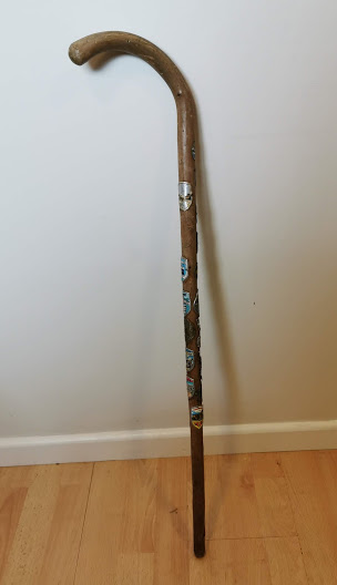 Walking stick with 16 Vintage Tourist Pin in badges