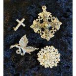 Group lot of white metal dress brooches and pendant.