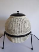 A Lloyd Loom 'Sputnik' linen basket