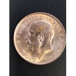 GREAT BRITAIN ROYALTY GOLD SOVEREIGN KING GEORGE V 1913 .Fine gold sovereign with profile of King Ge