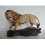 Beswick Lion on a Rock Figurine