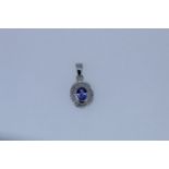 9k White Gold Tanzanite And Diamond Pendant