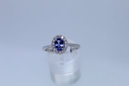 9k White Gold Tanzanite And Diamond Ring