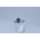 9k White Gold Tanzanite And Diamond Ring