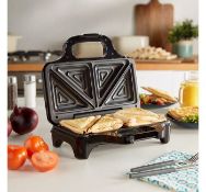 (OM68) 2 Slice Deep fill Sandwich Maker Make two toasties at once with portioned plates Deep ...