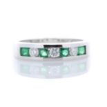 9ct White Gold Channel Set Semi Eternity Diamond And Emerald Ring 0.25 Carats