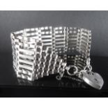 Wide link silver bracelet with padlock