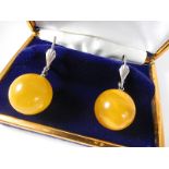 Yolk amber ball hinged earrings