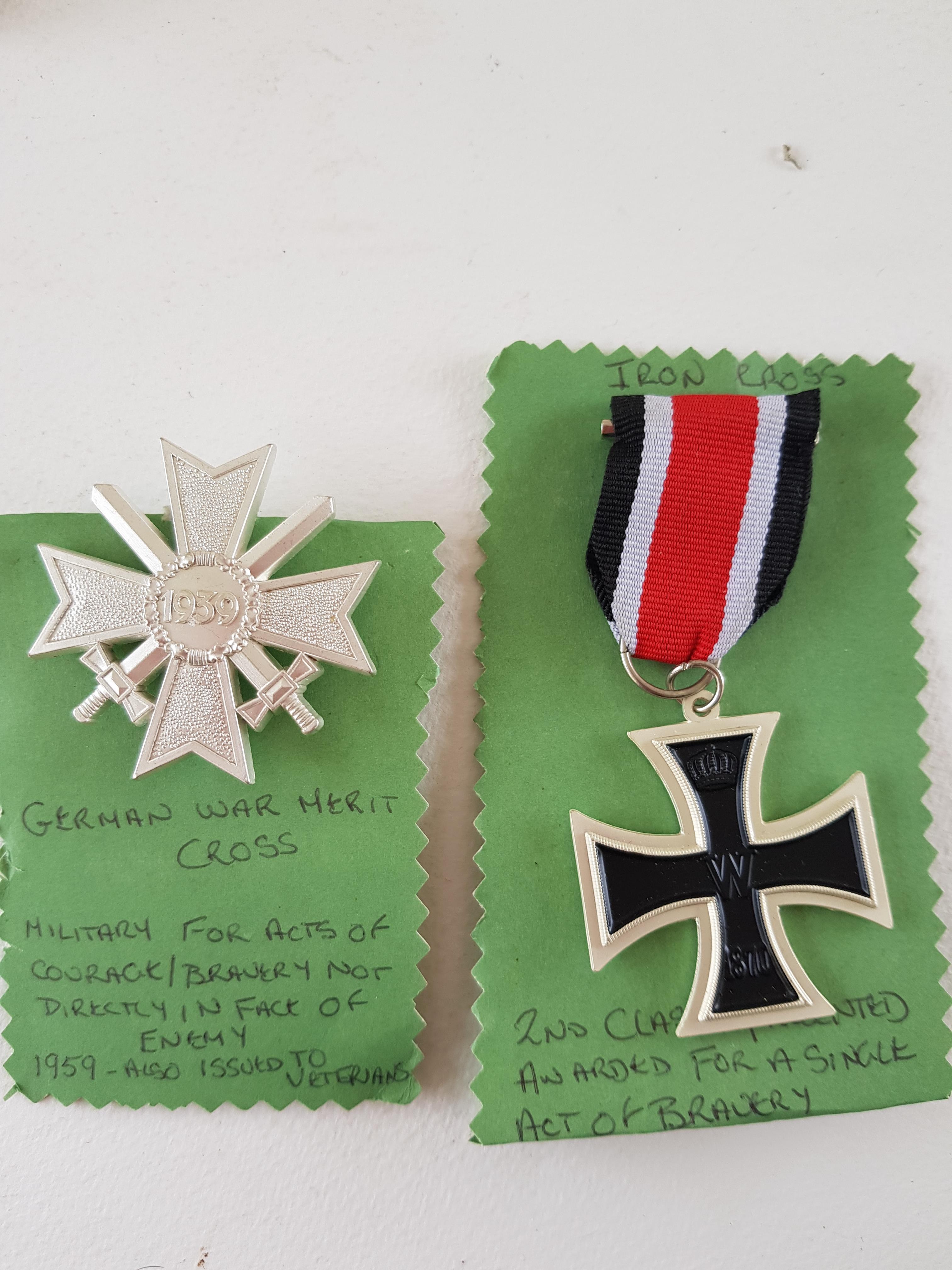 Iron Cross And German War Merit Badge.