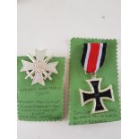 Iron Cross And German War Merit Badge.