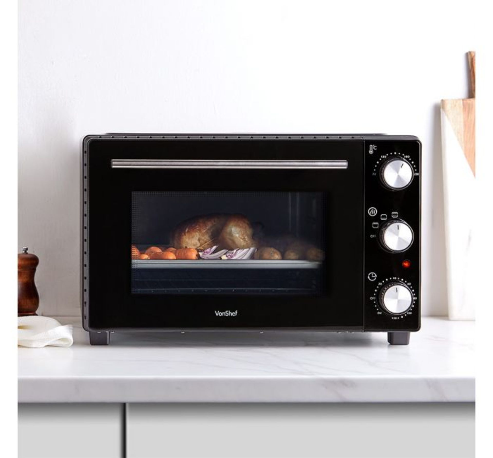 (OM77) 35L Mini Oven 600W power with multiple cooking functions Temperature ranges between 70...