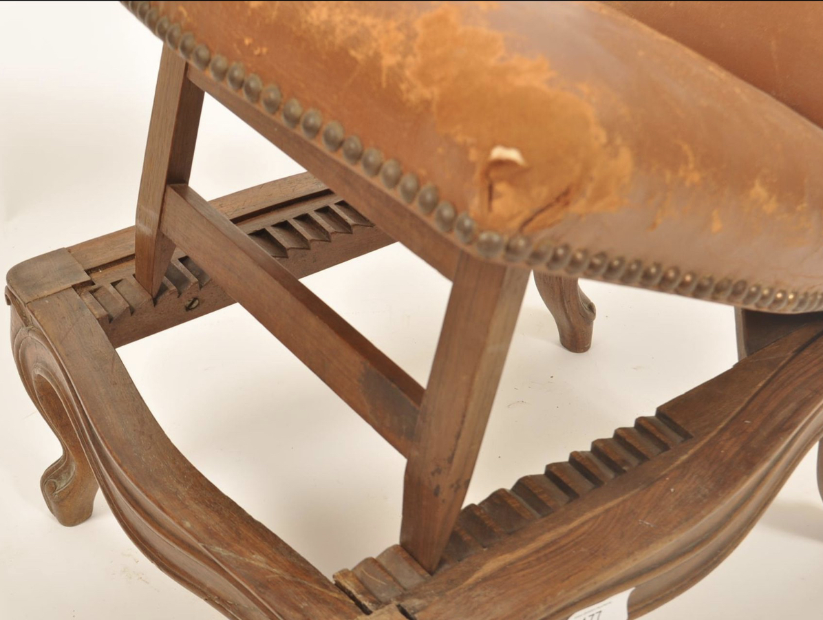 A 19th century oak and leather gout stool in the form of a French fauteuil. - Image 6 of 6