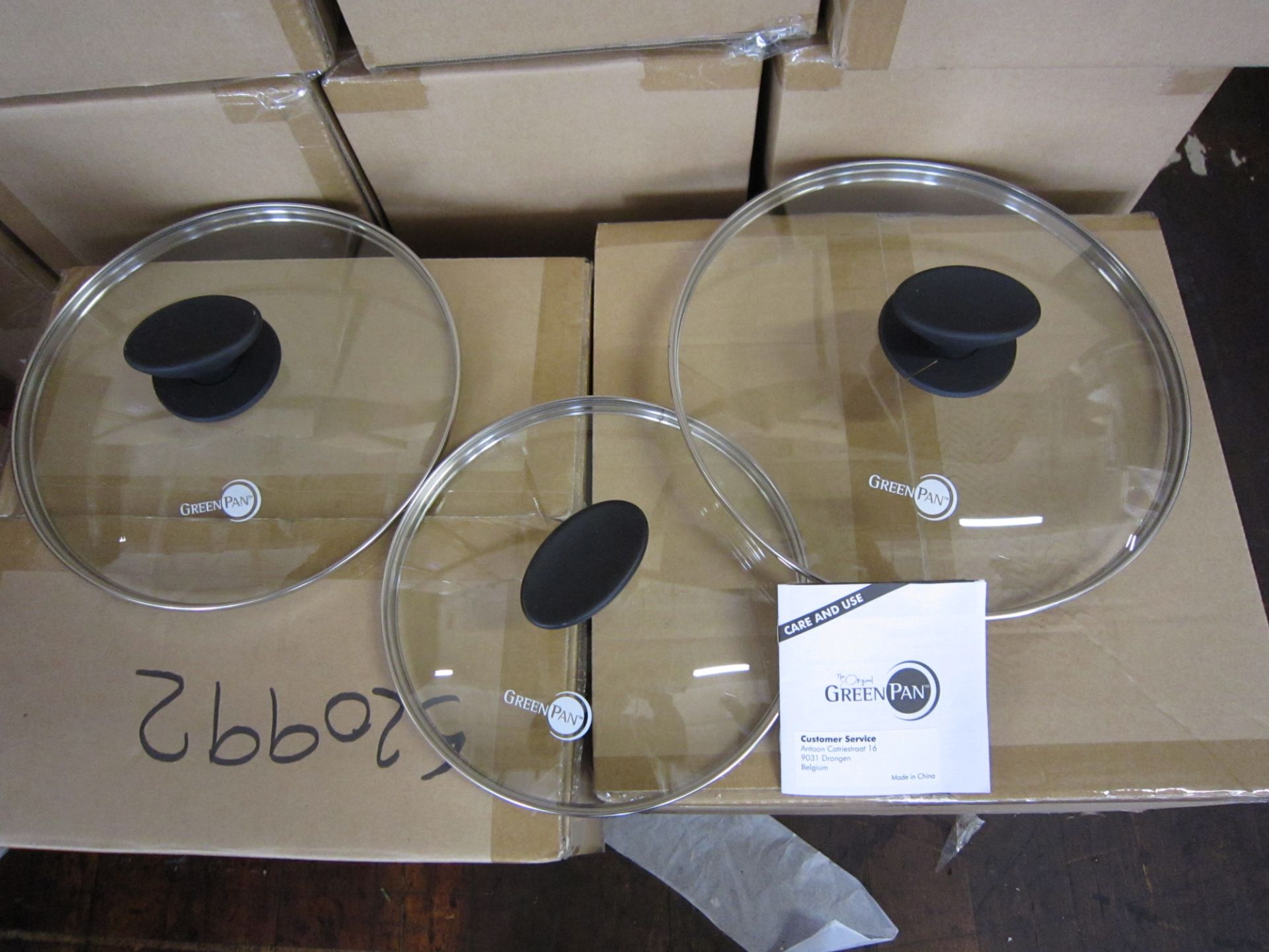 Original green pan lid set . 3 sizes, 20,26,28cm. 1 x pallet- 100 cartons /pallet new and sealed