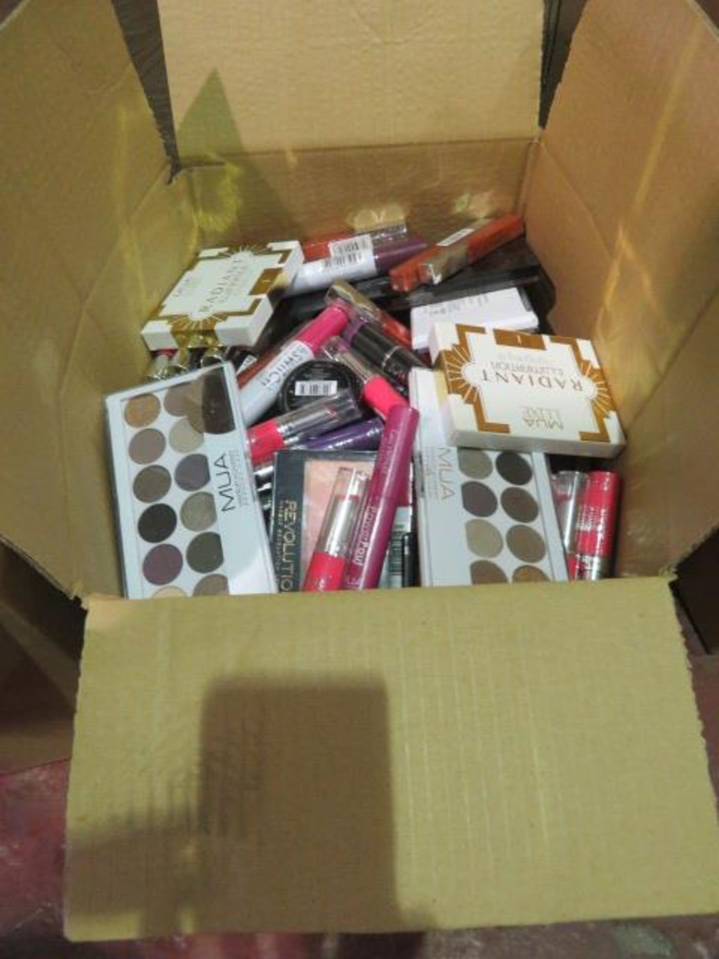 Circa. 200 items of various new make up acadamy make up to include: revolution eye shadow palet... - Image 2 of 2