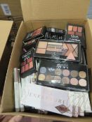 Circa. 200 items of various new make up acadamy make up to include: undress your skin radiant u...