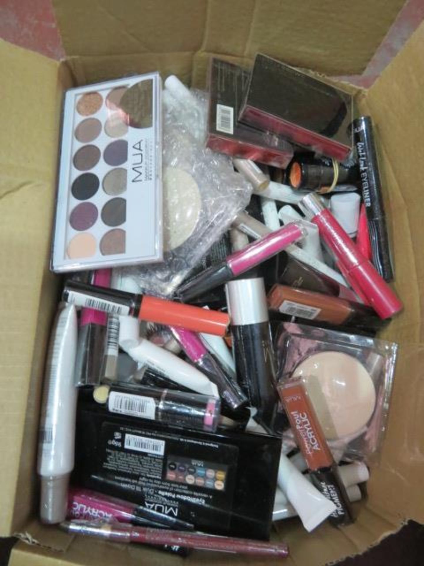 Circa. 200 items of various new make up acadamy make up to include: prism holographic stick, ey...