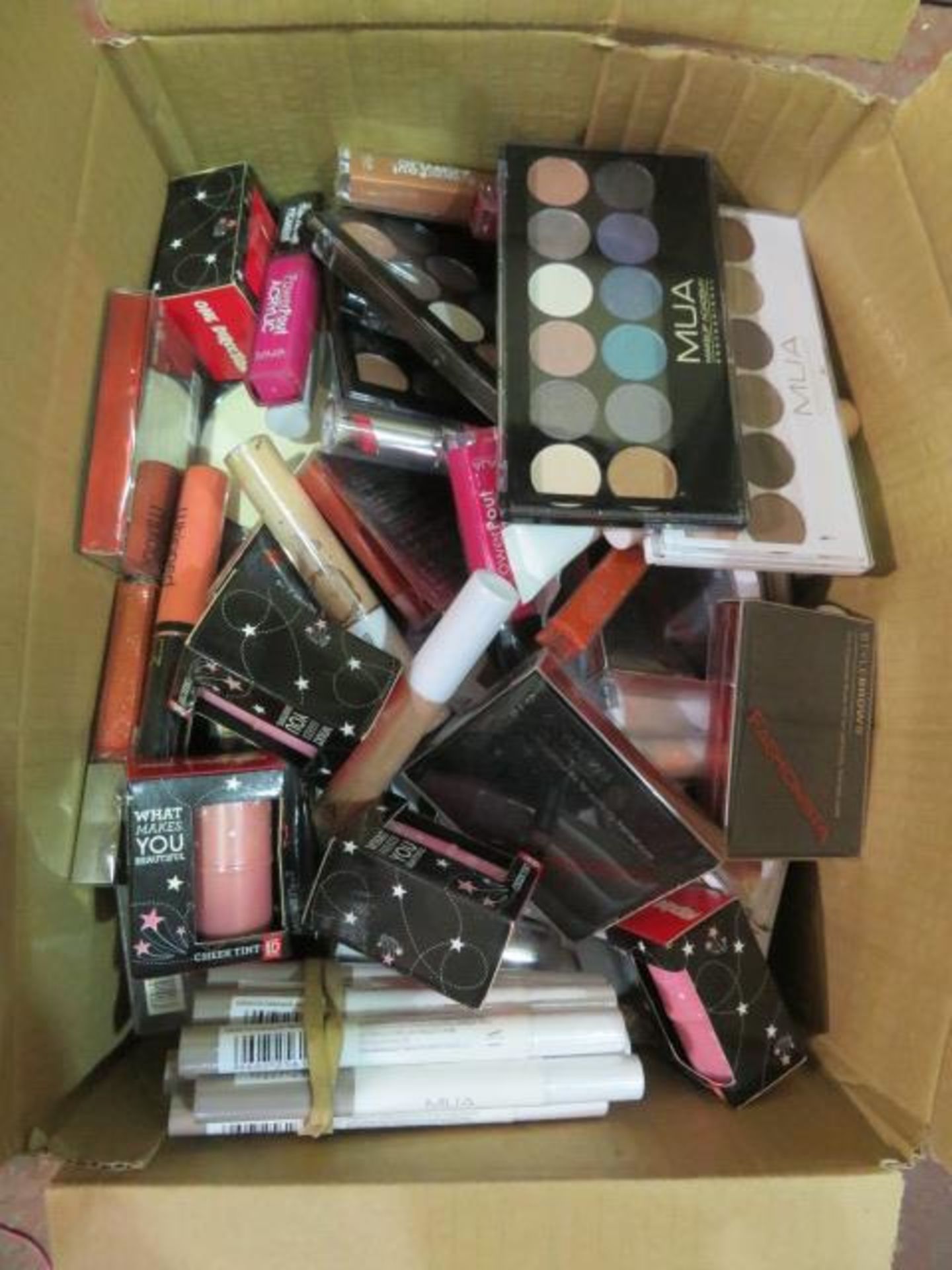 Circa. 200 items of various new make up acadamy make up to include: radiant under eye concealer...