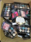 Circa. 200 items of various new make up acadamy make up to include: glow beam liquid highlight ...