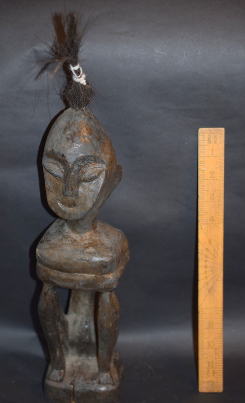 African Wood Carving Of Seated Man With Hair