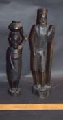 Two African Wood Carvings Of Man With Stick, Woman With Pot