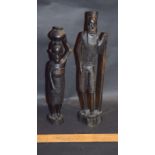 Two African Wood Carvings Of Man With Stick, Woman With Pot