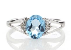 9ct White Gold Diamond And Blue Topaz Ring