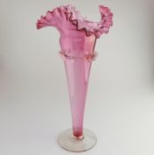 A giant Victorian cranberry glass Trumpet Vase C.19thC