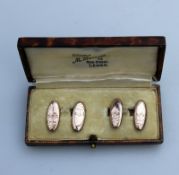 A boxed pair of 9ct gold engraved Cufflinks C.1916