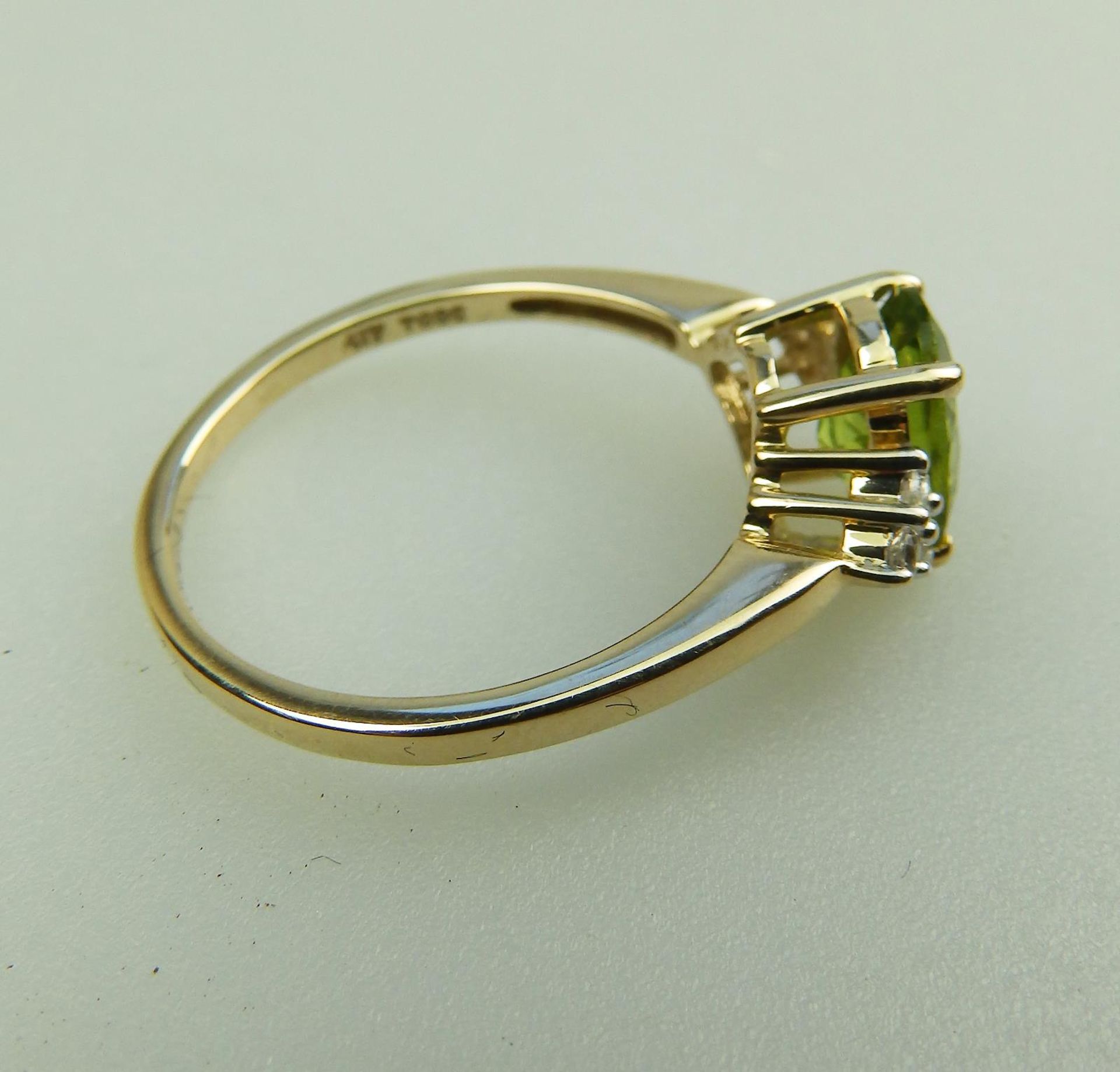 A 9ct gold, peridot and Diamond 7 stone Ring, boxed - Image 6 of 6