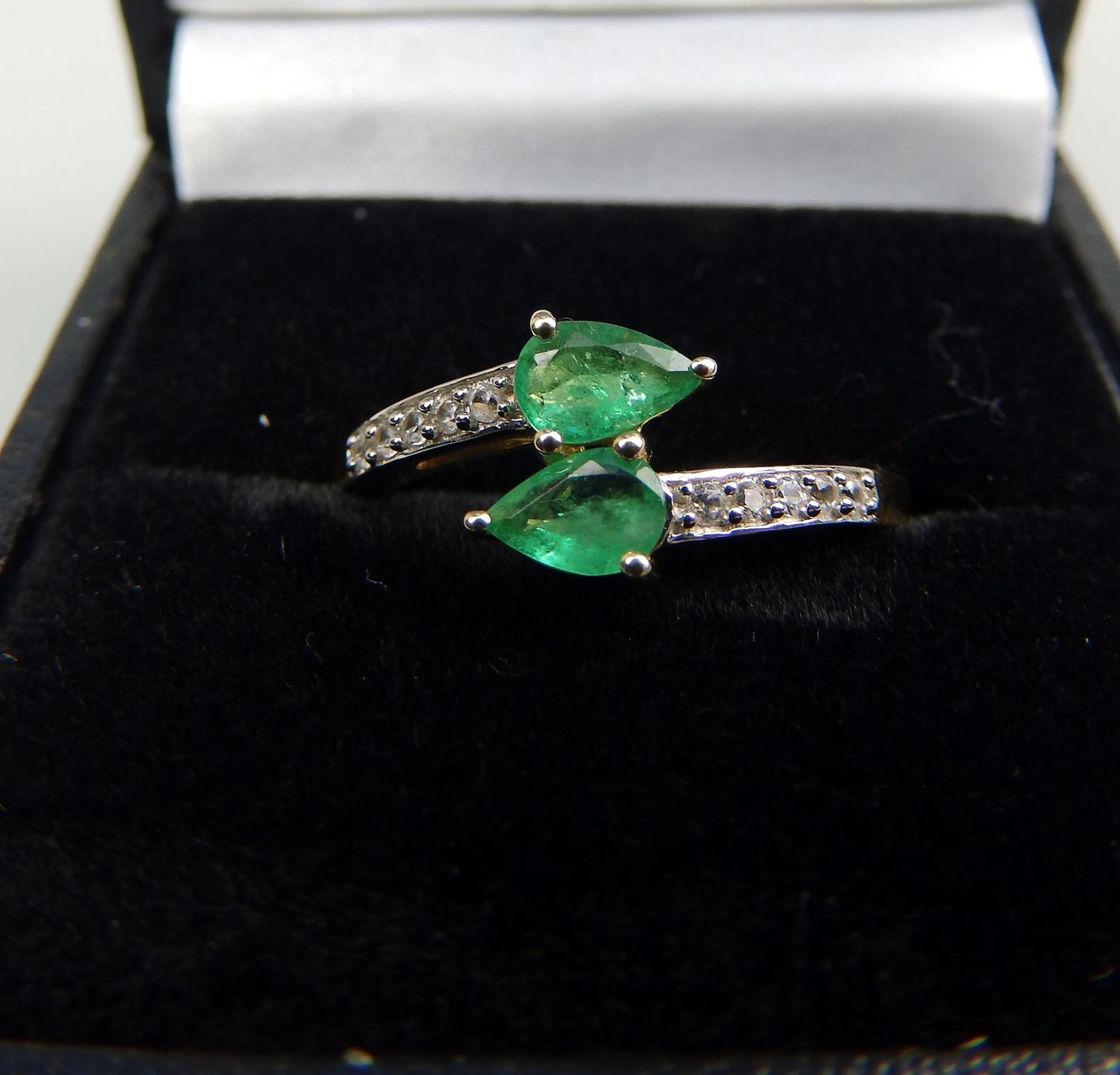 A 10ct gold, emerald and white topaz Crossover Ring, boxed - Image 3 of 5
