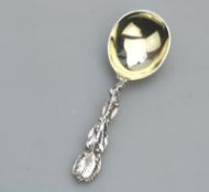 A solid silver Caddy Spoon, having cast tea plant handle C.1921