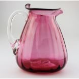 An unusual shape cranberry glass Victorian Jug C.19thC