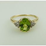 A 9ct gold, peridot and Diamond 7 stone Ring, boxed