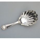 A solid silver Caddy Spoon, having shell bowl & terminal C.1915