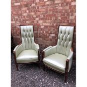 A Pair Of High Back Leather Arm Chairs