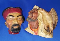 Two Chalkware Head Plaques Rare Legends Manarin, and Arab with Hawk