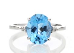 9ct White Gold Diamond And Blue Topaz Ring