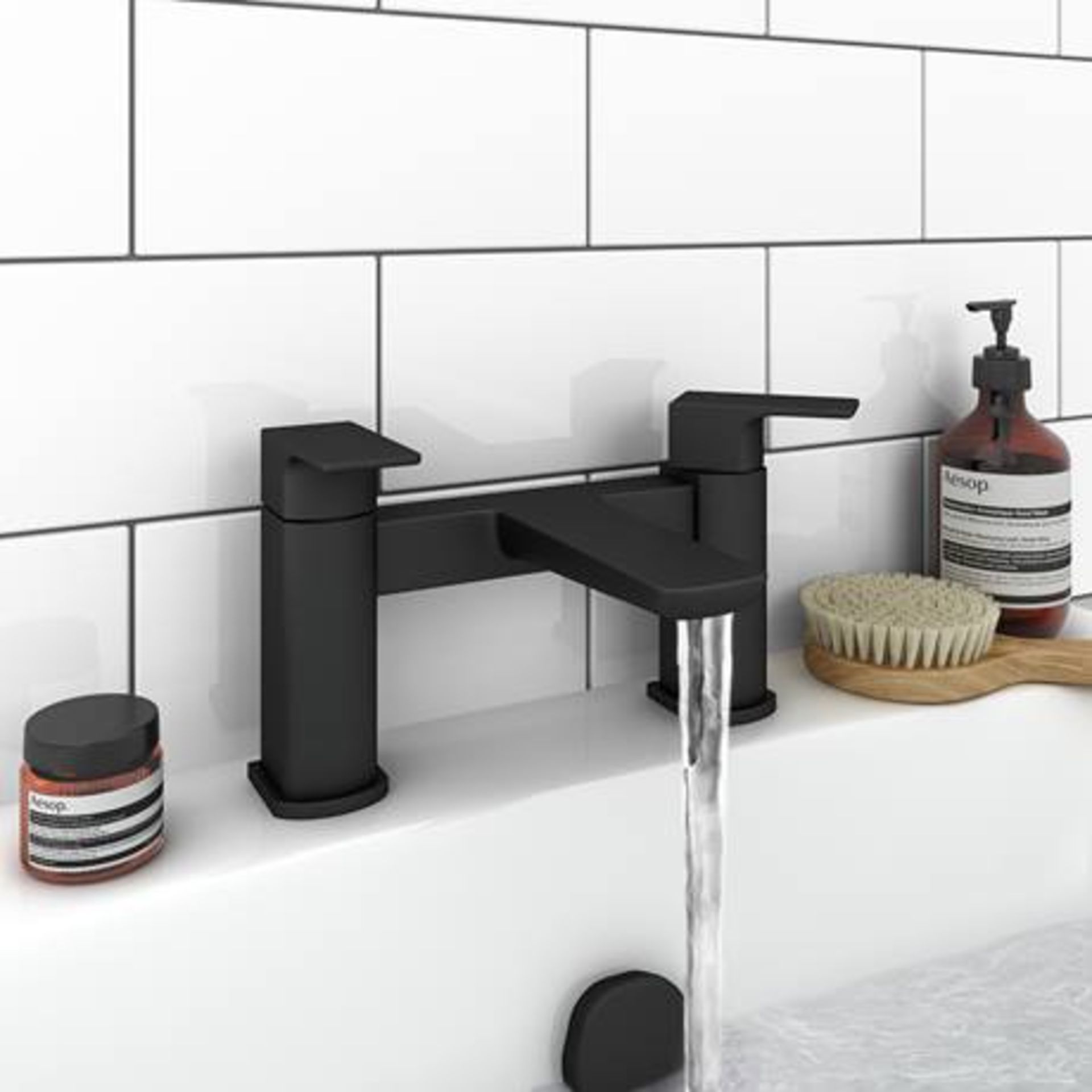 NEW (T2) Matt Black Bath Filler Tap. The matt black contemporary tap range featuring a stylish ...