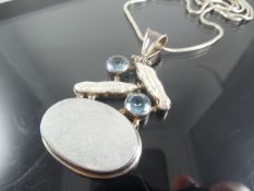 Silver necklace with pendant Topaz and Chalcedony