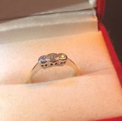 18 ct Gold 18 Platinum ring set with three diamonds