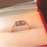 18 ct Gold 18 Platinum ring set with three diamonds